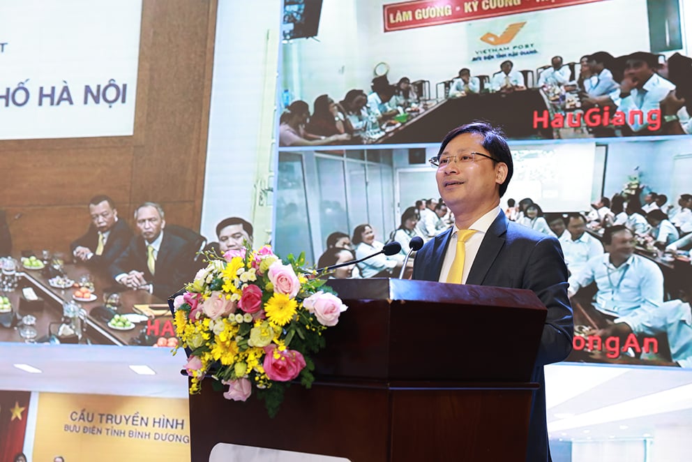 Tổng giám đốc Tổng công ty Bưu điện Việt Nam Chu Quang Hào chia sẻ trong buổi gặp mặt đầu xuân.