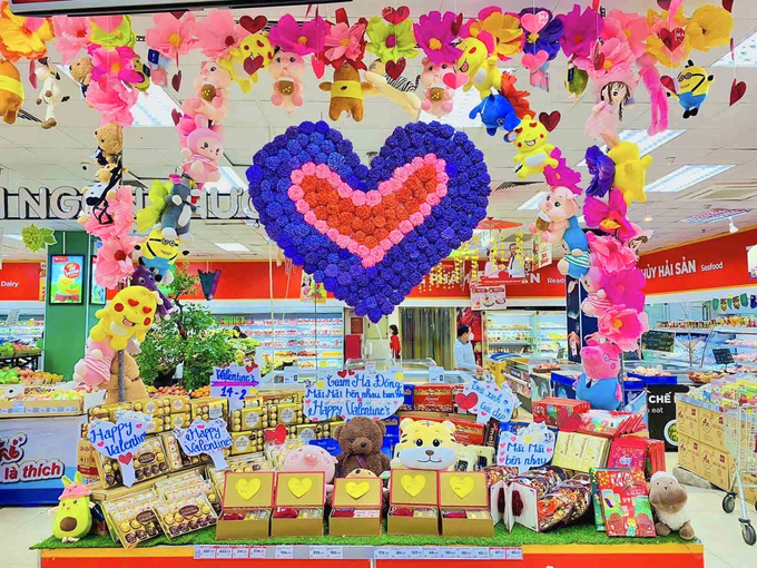 In celebration of Valentine's Day, WinMart is offering its customers price incentives on chocolate and teddy bears.