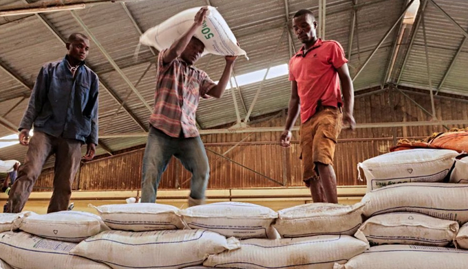 Workers move bags of fertilizer donated to Malawi by Russian company Uralchem in Mkwinda, Lilongwe, Malawi March 6, 2023.