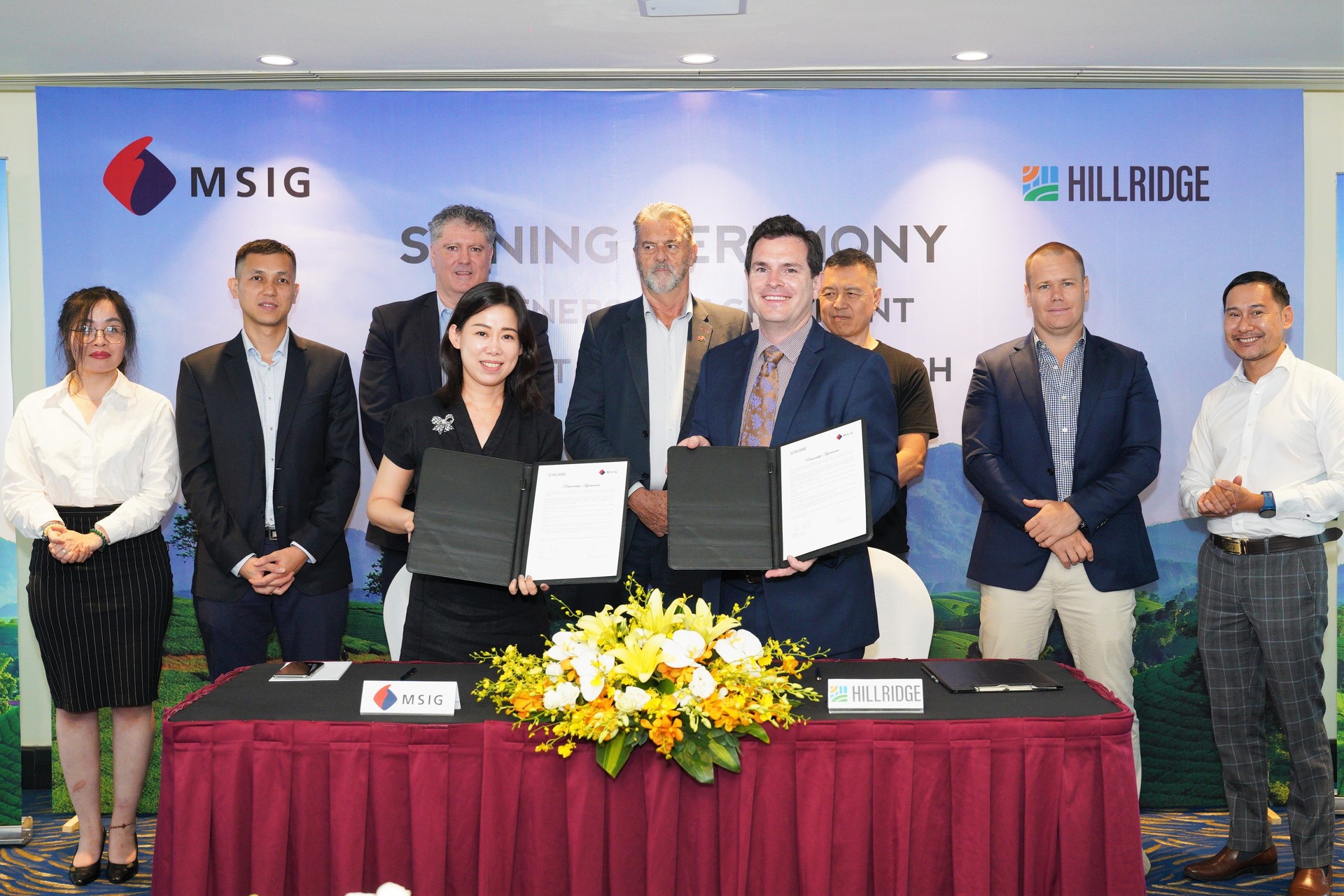The two companies signed a partnership agreement and launched a drought insurance product. Photo: Trung Quan.
