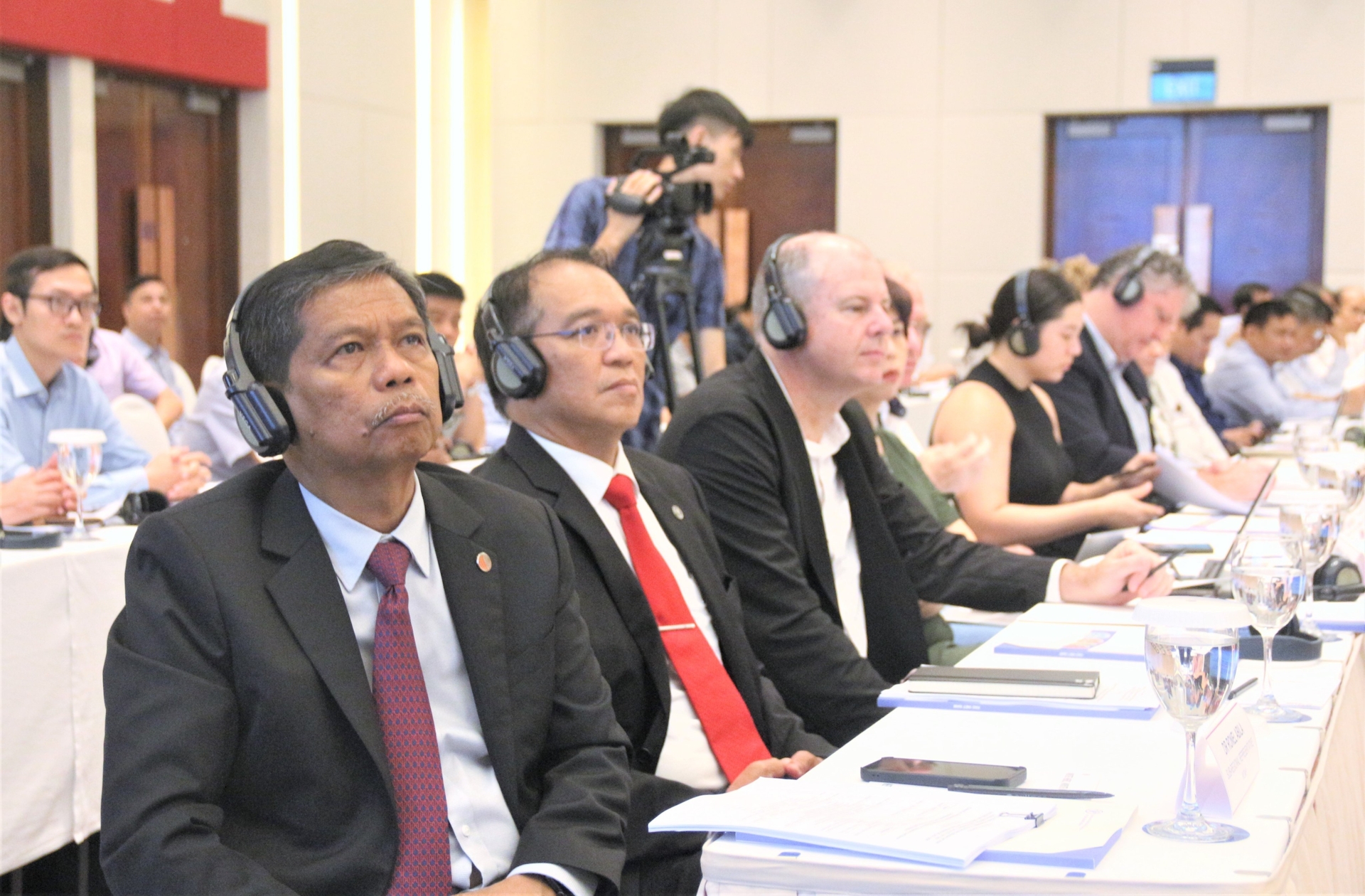 International delegates attend the meeting. 