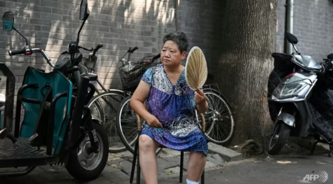 Beijing was hit by a heatwave in late June, prompting authorities to issue an alert. Photo: AFP/Greg Baker