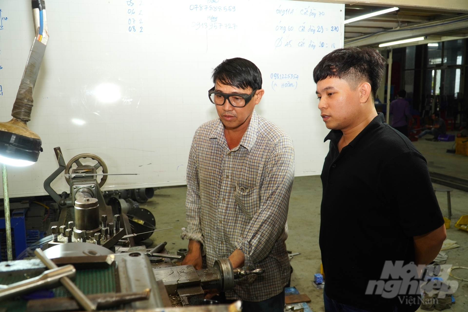 Workers at Farmx.vn Company Limited, which produces automated machines for shrimp feed in Ca Mau province. Photo: Kim Anh.