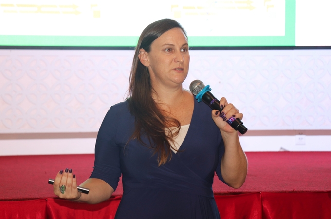 Dr. Katherine Nelson, climate change scientist and carbon market expert at IRRI, shares about the rice industry's carbon emission reduction certification roadmap. Photo: Kim Anh.