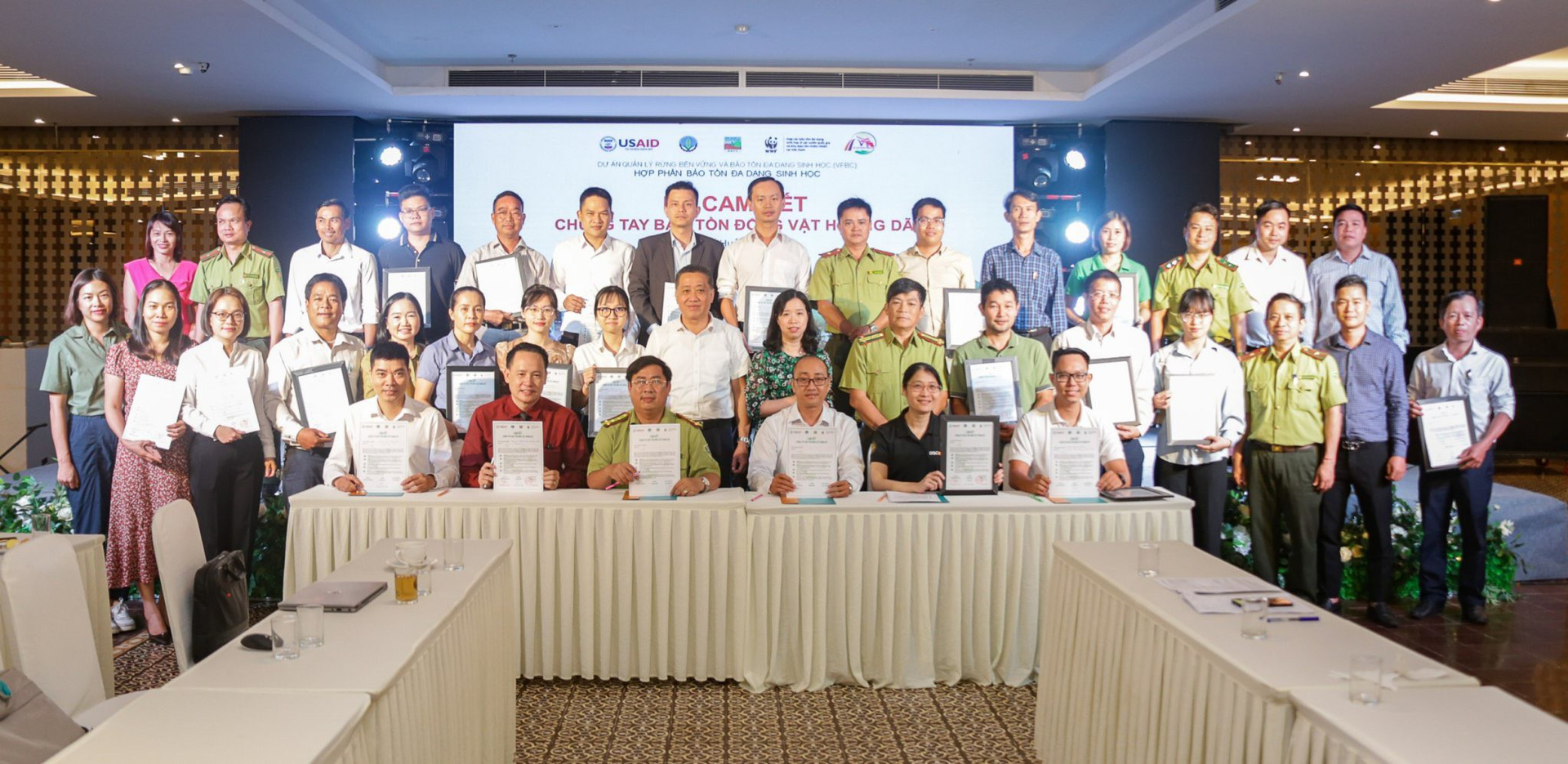 Participants of the panel discussion signed a joint commitment to protect wildlife. Photo: CD.