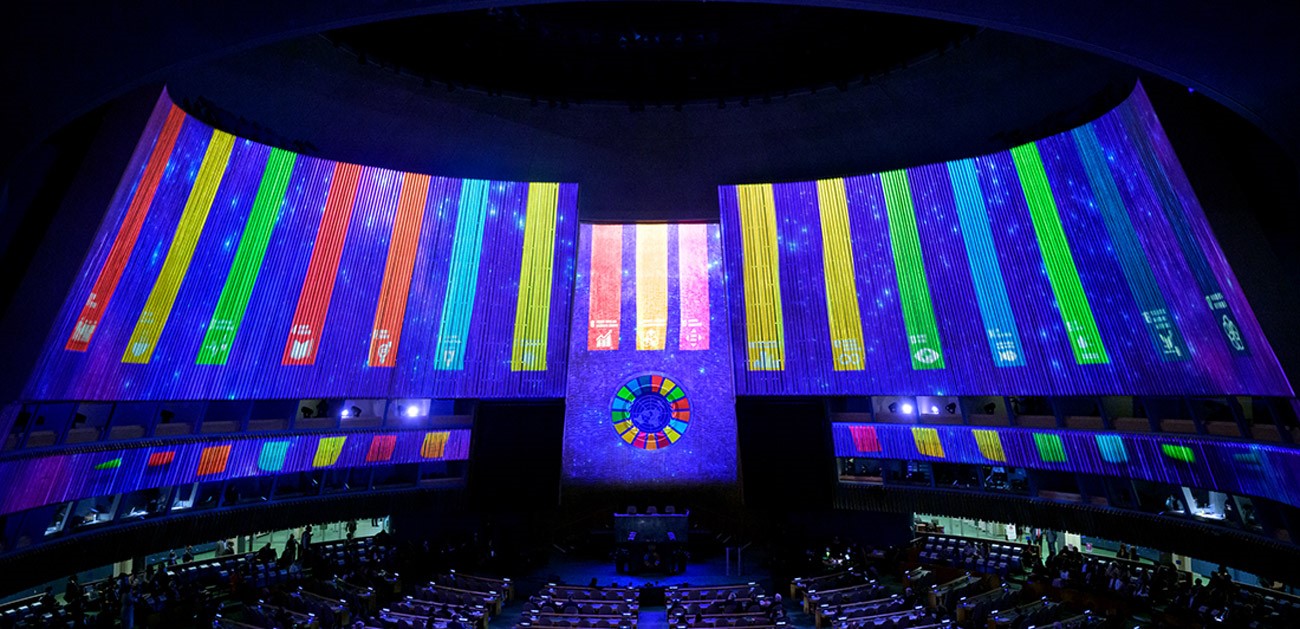 The UN General Assembly hall displays the 17 Sustainable Development Goals.
