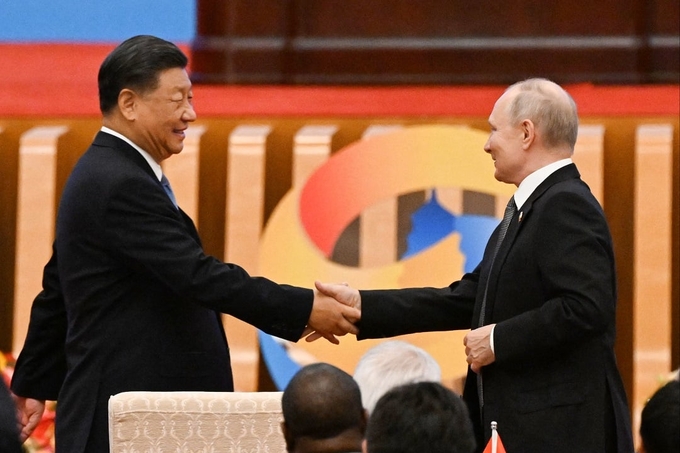 Chủ tịch Trung Quốc Tập Cận Bình và Tổng thống Nga Vladimir Putin tại Diễn đàn Vành đai và Con đường hôm 18/10. Ảnh: AFP.