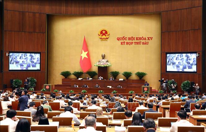 Quốc hội nghe trình bày báo cáo về tình hình kinh tế - xã hội. Ảnh: Phạm Kiên/TTXVN.