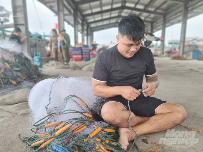 Gia đình anh Phạm Văn Tình sống ổn nhờ nghề biển. Ảnh: Việt Khánh.