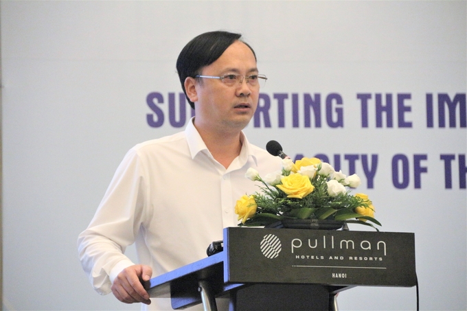 Deputy Director of Department of Animal Health Phan Quang Minh spoke at the consultation conference. Photo: Bao Thang.