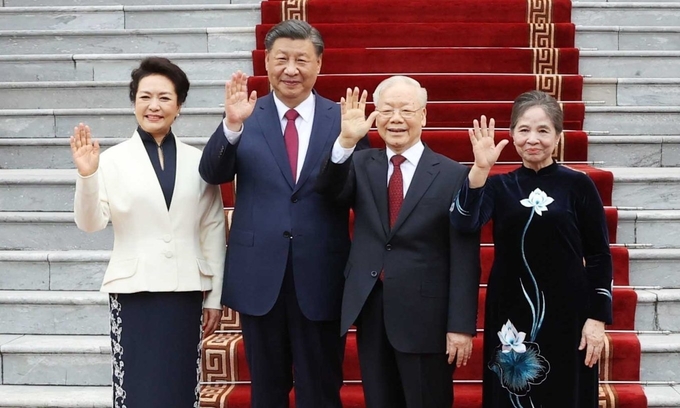 Tổng Bí thư Nguyễn Phú Trọng và Phu nhân chụp ảnh chung với Tổng Bí thư, Chủ tịch Trung Quốc Tập Cận Bình và Phu nhân tại Phủ Chủ tịch chiều 12/12. Ảnh: TTXVN.