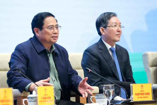 Thủ tướng Chính phủ Phạm Minh Chính đối thoại với nông dân tại Hội nghị. Ảnh: VGP.