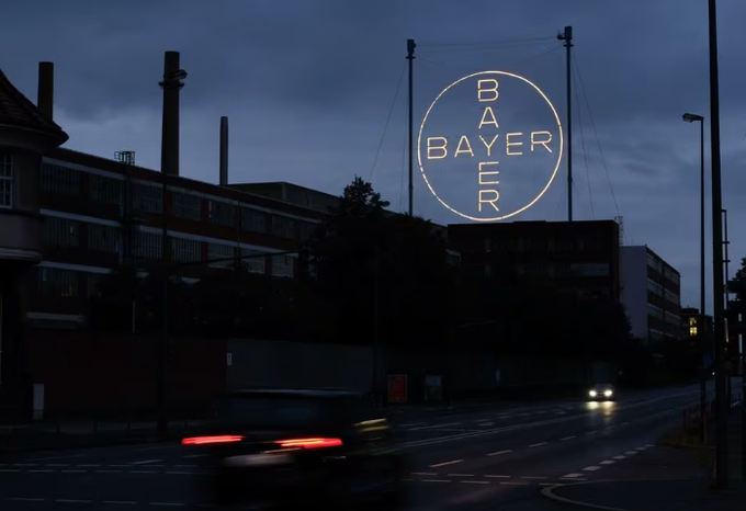 The 120 metres high Bayer Cross, logo of German pharmaceutical and chemical maker Bayer AG, consisting of 1710 LED glass bulbs is seen outside the industrial park 'Chempark' of the chemical industry in Leverkusen, Germany, September 23, 2023. 