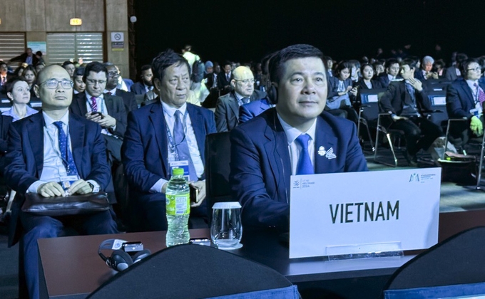 Bộ trưởng Bộ Công thương Nguyễn Hồng Diên - Trưởng Đoàn Công tác Việt Nam - dự Phiên khai mạc MC13. 