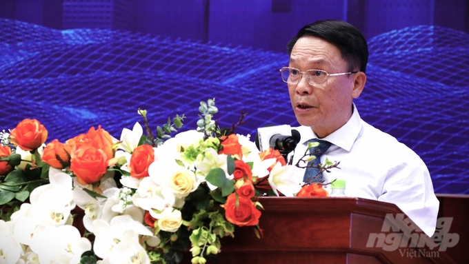 Phó Chủ tịch Thường trực Hội Nhà báo Việt Nam Nguyễn Đức Lợi báo cáo tại hội nghị. Ảnh: Trần Phi.