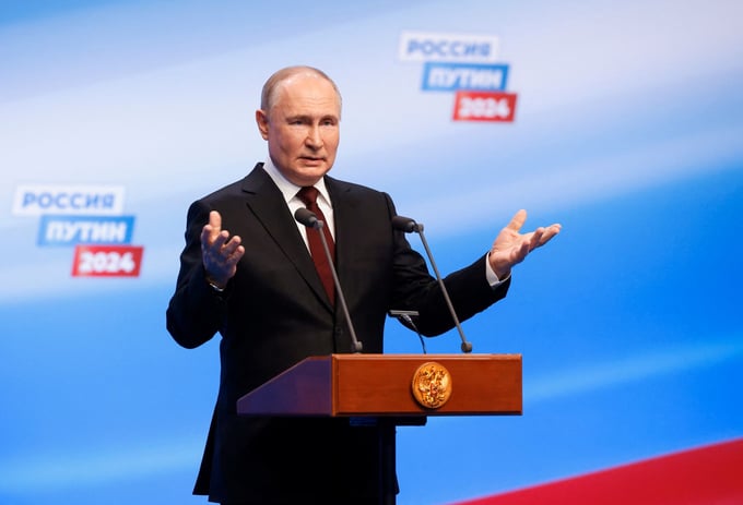 Tổng thống Vladimir Putin phát biểu cảm ơn người dân bỏ phiếu cho mình tại Moscow, Nga, hôm 17/3. Ảnh: Reuters.