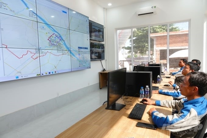 Technical staff are testing the flood risk management information system (FRMIS). Photo: Kim Anh.