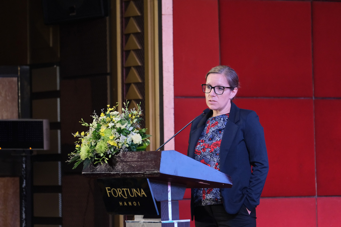 Ms. Sonja Esche, the Agricultural Team Leader of the German Corporation for International Cooperation (GIZ) speaking at the conference. Photo: Quynh Chi.