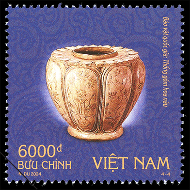 Thống gốm hoa nâu.