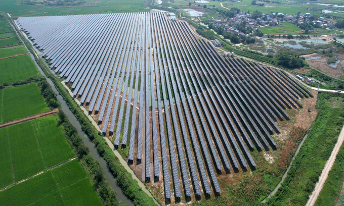 Photo taken on August 9, 2024 shows an agricultural complementary photovoltaic (PV) power station in Guosheng village, East China's Anhui Province. In recent years, Guosheng has been adhering to green development, combining PV power stations with agriculture, allowing clean electricity generation and farming to take place simultaneously. Photo: VCG.