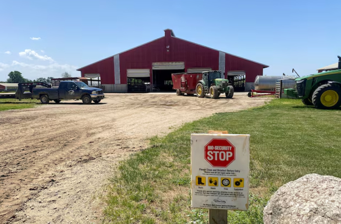 A warning sign is placed at a dairy farm in Martin, Michigan, U.S., June 6, 2024.