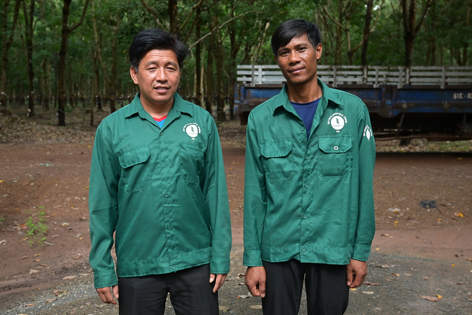 Moeurng Vanng (right) and Buoy Sophorn are Cambodian indirect management staff within the Phuoc Hoa Kampong Thom Rubber system. Photo: Tung Dinh.