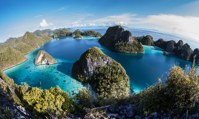 A lagoon surrounded by limestone islands in Raja Ampat, Indonesia. Ocean acidification is getting worse globally, say experts. Photo: Getty.