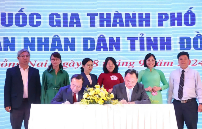 UBND tỉnh Đồng Nai phối hợp cùng Đại học Quốc gia Thành phố Hồ Chí Minh (ĐHQG-HCM) ký kết hợp tác trên nhiều lĩnh vực. Ảnh: H.Phúc.