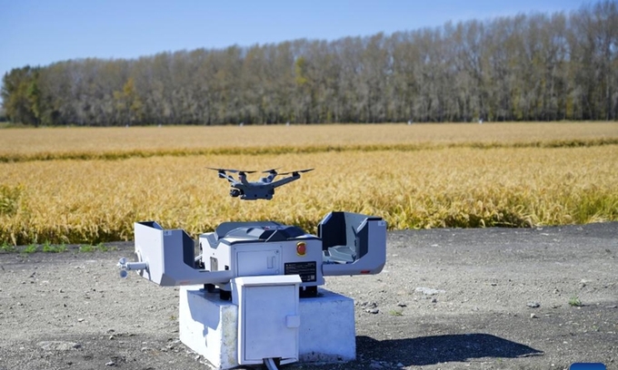 A drone returns automatically after an intelligent field patrol mission at an agricultural experiment station in Shuangyashan City, northeast China's Heilongjiang Province, Sept. 28, 2024.