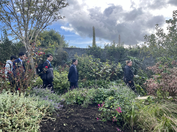 The Minister and delegates visit the ecological garden at Airfield Estate. Photo: ICD.