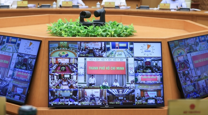 The meeting was connected online with 63 localities. Photo: Nhat Bac.