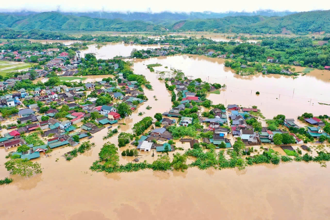 Thiệt hại do thiên tai gây ra sau bão số 3 là quá nặng nề đối với đồng bào 26 tỉnh, TP phía Bắc. Ảnh: Hồng Thắm