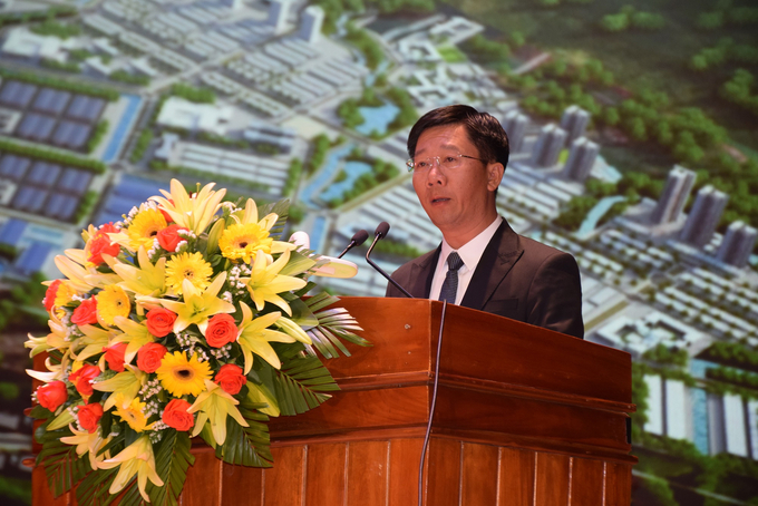 Mr. Nguyen Van Lang, General Director of Becamex Binh Dinh Joint Stock Company, presented at the conference. Photo: V.D.T.