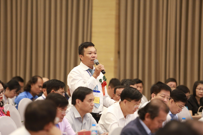 Farmer delegates speak at the forum. Photo: Dan Viet.