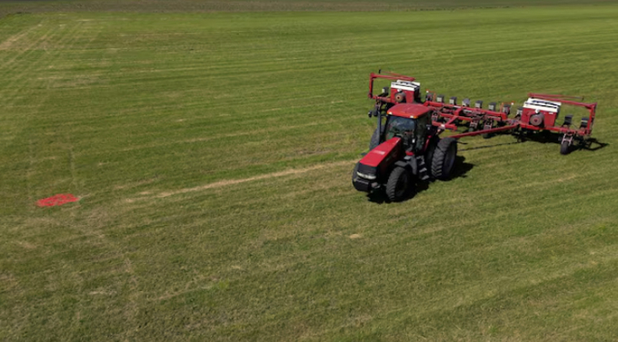 A drone view shows Mark Tuttle's tractor and soybean planter parked on his soy farm in Somonauk, Illinois, U.S., May 30, 2024. 