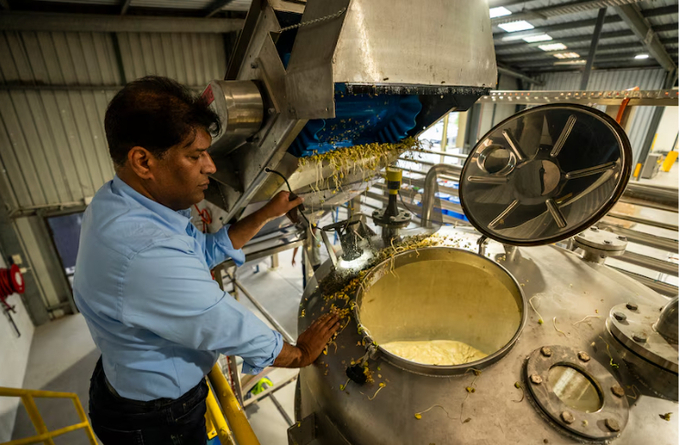 Dr Jahangard demonstrates how the food waste is processed.