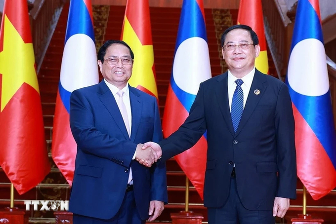 Trong chuyến tham dự Hội nghị Cấp cao ASEAN, sáng 8/10/2024, Thủ tướng Phạm Minh Chính hội kiến Thủ tướng Lào Sonexay Siphandone. Ảnh: TTXVN.