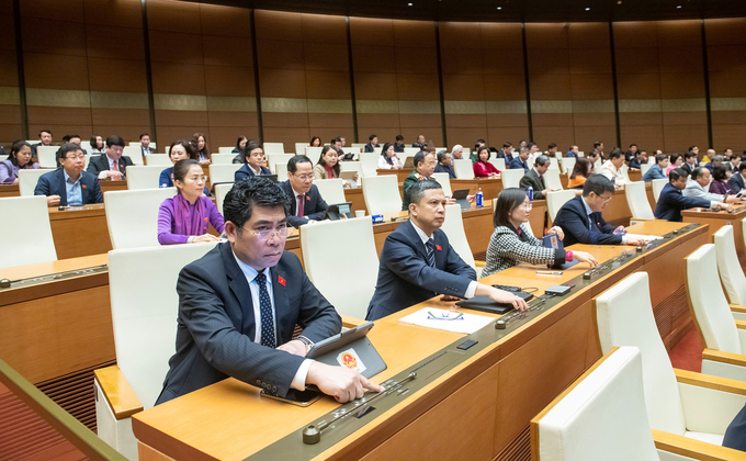 The National Assembly voted to approve the Resolution on the investment policy for the Lao Cai - Hanoi - Hai Phong railway construction project. Photo: Pham Thang.