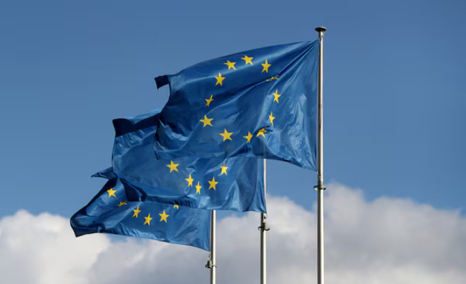 European Union flags fly outside the EU Commission headquarters in Brussels, Belgium September 19, 2019. REUTERS/Yves Herman/File Photo Purchase Licensing Rights.