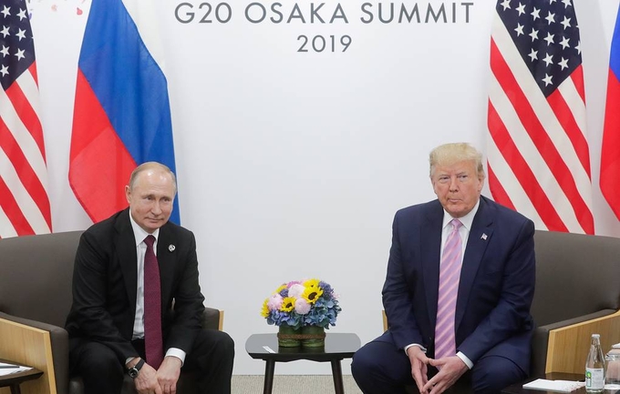 Tổng thống Nga Vladimir Putin và Tổng thống Mỹ Donald Trump. Ảnh: TASS.