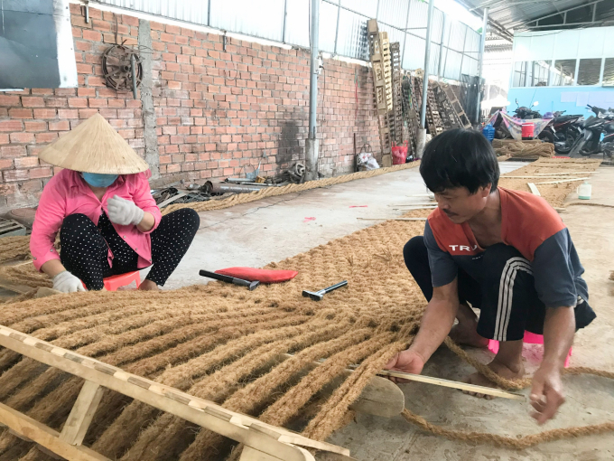 Coir carpet weavers at Indochina Coconut Company Limited. Photo: Minh Dam.