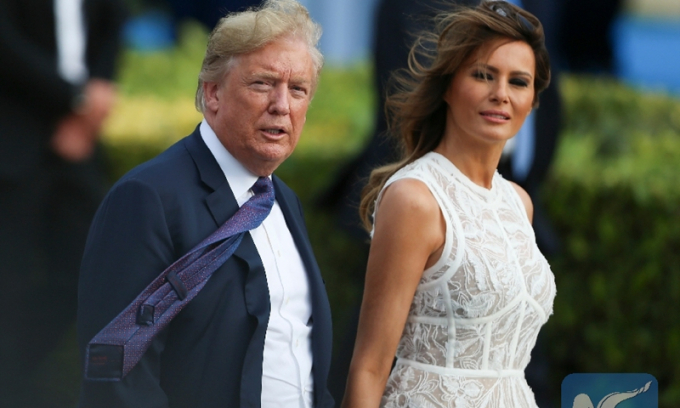 Tổng thống Mỹ Donald Trump và phu nhân Melania Trump đi dự Hội nghị thượng đỉnh NATO tại Brussels, Bỉ, ngày 11/7/2018.  Ảnh: Reuters/AP
