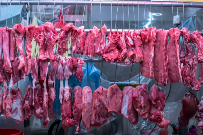 Pork meat on stall in China. Photo: RT