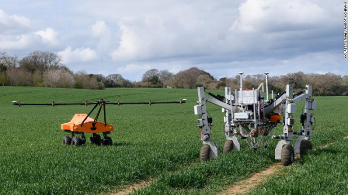 Tom (left) and Dick (right) are farming robots that work together to kill weeds without using chemicals