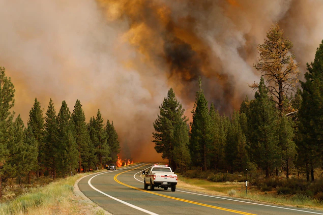 Wildfires produce plumes of smoke that can be a serious health hazard. In Markleeville, east of Sacramento, California, emergency crews are working around the clock to contain the Tamarack Fire, which so far has burned more than 21,000 acres. Photo: AP