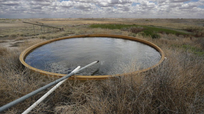 A natural spring fed by the Ogallala Aquifer fills a stock tank that provides water for wildlife at the Muleshoe National Wildlife Refuge outside Muleshoe, Tex., on Tuesday, May 18, 2021. Photo: AP 