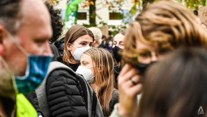 Greta Thunberg was flanked by fellow climate activists throughout a protest march through Glasgow. Photo: Jack Board