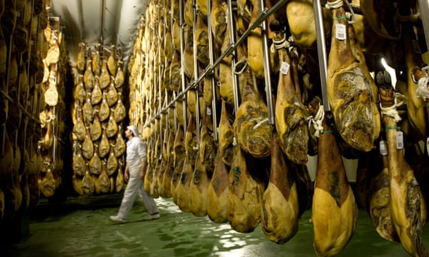 Rows of dry-cured Jamon Iberico de bellota (acorns) in the Estrella de Castilla factory in Guijuelo, near Salamanca, Spain. Photo: Denis Doyle/Getty Images