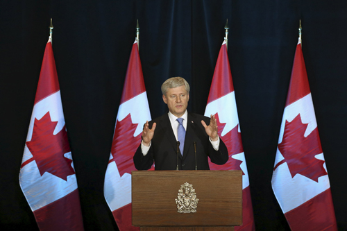 Thủ tướng Canada Stephen Harper trong cuộc họp báo về TPP hôm qua. Ảnh: Reuters