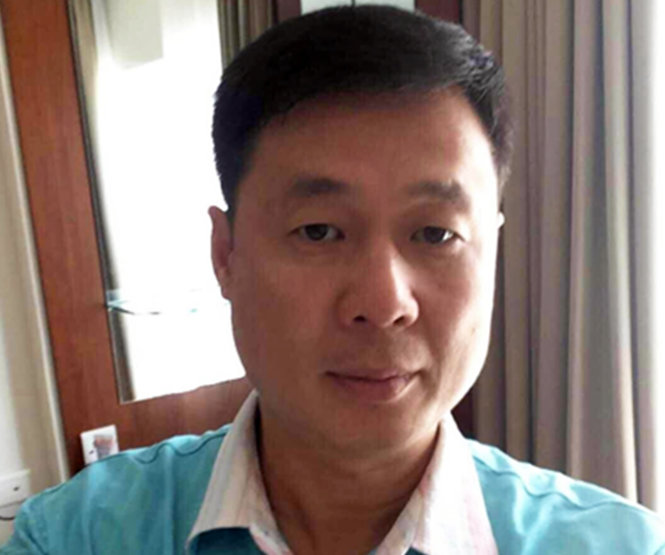 Yin Wen Sheng khi đang làm việc tại công an tỉnh Khánh Hòa -  Ảnh: Hồ sơ điều tra của công an
